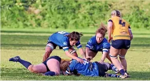  ?? ?? Bath Rugby Ladies involved in a ruck during their victory over Henley