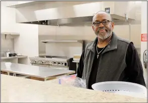  ?? (Arkansas Democrat-Gazette/Sean Clancy) ?? Ronald Wilkerson stands in the kitchen at Bridge 2 Success, the after-school and summer program he founded in 2011 to give students a safe, positive place where they can get help with schoolwork, have healthy meals and work on life skills.