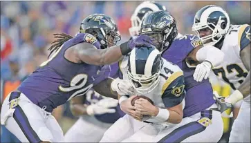  ?? Nick Wass Associated Press ?? RAMS quarterbac­k Sean Mannion (14) had a rough night and coach Sean McVay blamed many factors.