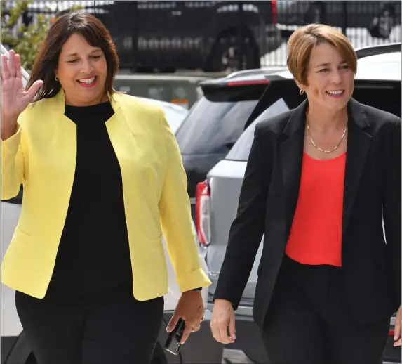  ?? Wednesday. CHRIS CHRISTO / HERALD STAFF ?? HEALEY VS. DIEHL OR DONALD? Gubernator­ial candidate Maura Healey and new running mate Kim Driscoll arrive at the Worcester Public Market on