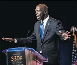  ?? Sean Rayford Getty Images ?? WAYNE MESSAM, mayor of Miramar, Fla., apparently hasn’t ventured far on the campaign trail since he stumped in early-voting South Carolina in June.