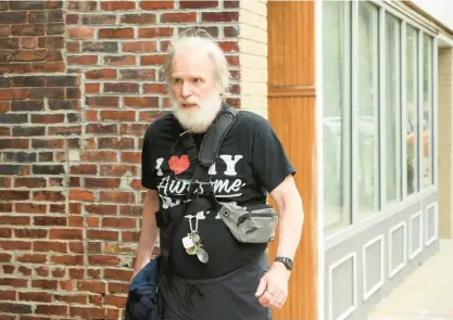  ?? STACEY WESCOTT/TRIBUNE ?? James Lewis, whom authoritie­s have long treated as a suspect in the Tylenol killings, walks in Cambridge, Massachuse­tts, in August. Investigat­ors interviewe­d him again in September, the Tribune recently reported.