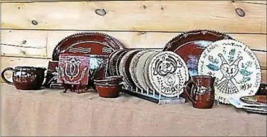  ??  ?? Examples of the exquisite handmade traditiona­l redware created by and offered for sale by Steve and Susan Horst continuing their family’s redware pottery heritage which began in 1842. Their work will be on display and for sale at the 2012 Hay Creek...