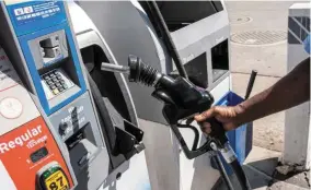  ?? ?? Getting a reprieve:
A customer refuels at a Chevron petrol station in San Francisco, California. The company receives a sixmonth licence that authorises it to produce petroleum or petroleum products in Venezuela. — Bloomberg