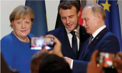  ?? ?? Angela Merkel with Emmanuel Macron and Vladimir Putin in December 2019. Photograph: Charles Platiau/Reuters