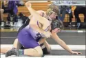  ?? Jeremy Stewart ?? Rockmart’s Dalvin Millhollan (top) works to gain control over his opponent during Friday’s dual match with Upson-Lee.