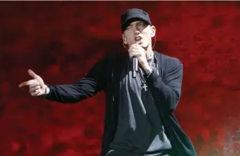  ?? JASON DECROW/THE ASSOCIATED PRESS FILE PHOTO ?? Fans of rapper Marshall Mathers, known as Eminem, have a chance to invest directly in the star’s music.