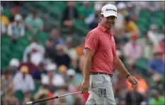  ??  ?? Brian Harman smiles on the 18th green during the third round of the U.S. Open golf tournament Saturday at Erin Hills in Erin, Wis.