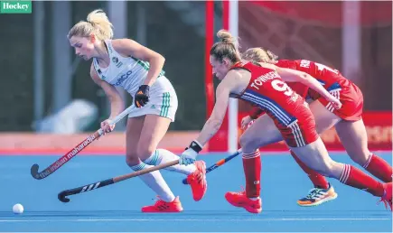  ??  ?? On the run:
Ireland ace Chloe Watkins attempts to evade the lurking Susannah Townsend of Great Britain