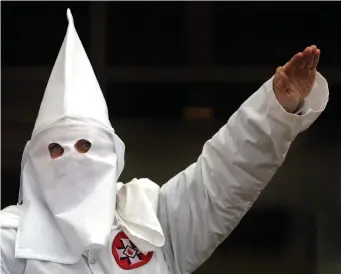  ?? (Tim Boyle/Newsmakers) ?? KKK KLANSMAN – America isn’t the only place with a supremacy problem.