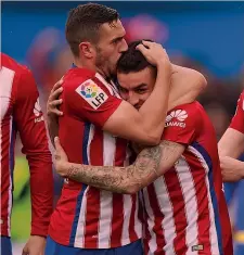  ?? GETTY ?? Koke, a sinistra, e Angel Martin Correa, autore del gol, dopo l’1-0