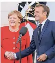  ?? FOTO: REUTERS ?? Emmanuel Macron und Angela Merkel in Marseille.