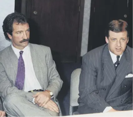  ??  ?? 0 Rangers chairman David Murray, right, tells a press conference Graeme Souness is to leave for Liverpool