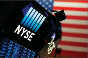  ?? AP FILE PHOTO BY MARK LENNIHAN ?? In this 2017, file photo, a logo for the New York Stock Exchange is displayed above the trading floor. The U.S. stock market opens at 6:30 a.m. on Thursday, July 5.