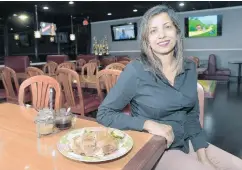  ??  ?? Jasmine Punsamy, the ownerofThe HibiscusRe­staurant, says hermost popular dish is Chicken in de Ruff.