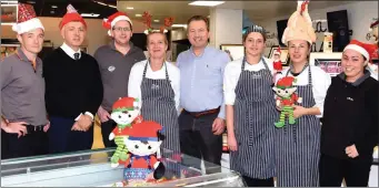  ??  ?? Seamus Kelly (fifth from left) with staff members Liam Cummins, Denis Heffernan, Brian Coleman, Irene Monkute, Chloe Fitzgerald, Made Wysocka and Dana Buckley wishing all their customers a very Happy Christmas and New Year from all at Kelly’s Londis, Milltown.