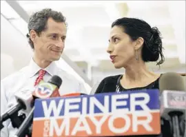  ?? Kathy Willens Associated Press ?? ANTHONY WEINER and wife Huma Abedin in 2013. Their relationsh­ip had been strained since his second sexting scandal sunk his mayoral bid.
