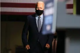  ??  ?? Joe Biden in Pennsylvan­ia on Thursday. Biden said if he won in November, he would be ‘laser-focused on working families’. Photograph: Spencer Platt/Getty Images