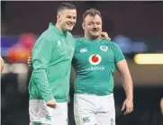  ?? REUTERS ?? Ireland’s Johnny Sexton, left, and Cian Healy celebrate a win.