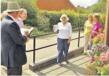  ??  ?? Pictured, centre, is Brenda Booth, about to show the judges around Holloway House.