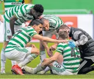  ??  ?? Concerned faces all round after James Forrest went down injured