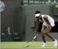  ?? TIM IRELAND — THE ASSOCIATED PRESS ?? Venus Williams smiles during her match against Elise Mertens on the opening day at Wimbledon.