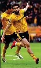  ?? ?? RAY OF LIGHT: Ait-Nouri celebrates after opening the scoring for Wolves
