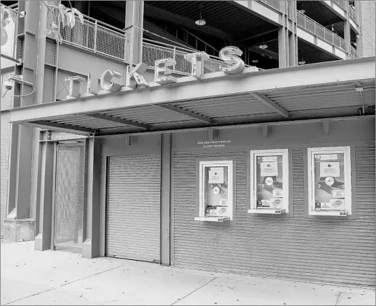  ?? CASSANDRA KLOS/NEW YORK TIMES ?? Fenway Park in Boston on May 28. After another proposal from MLB owners, and more scoffing from the players, a 50-game season seems to be the best possible outcome.