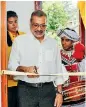  ??  ?? Pickme Chairman Ajit Gunewarden­e cutting the ribbon at the Pickme Kandy Office