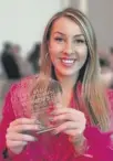  ?? ?? ↑ Victoria Nicol with her Young Entreprene­ur award