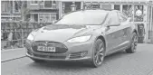  ??  ?? JASPER JUINEN,
BLOOMBERG The Tesla Model S electric car tops the favorites list.