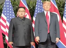  ??  ?? NORTH Korean leader Kim Jong-un, left, met US President Donald Trump on Sentosa Island, in Singapore, on June 12, 2018. | AP