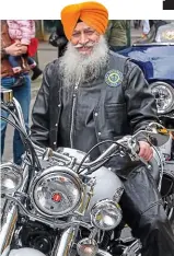  ??  ?? Easy rider: A Sikh biker in his turban