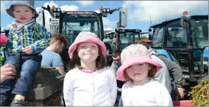  ??  ?? Sally May, Emily Jo and Jack Edward Morrissey from Banteer enjoyed the sunshine at the Tractor Run from Kilcorney. Photos: John Tarrant