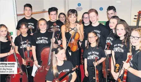  ??  ?? Making music Nicola Benedetti with Big Noise children in 2015