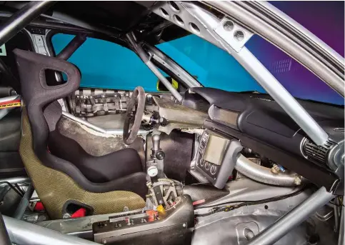  ??  ?? Above left: naturally aspirated and longitudin­ally mounted four-cylinder engine was down on power compared with rivals and sat a long way forward. Above: Frank Biela won the 1996 BTCC drivers’ title from this chair. Right: brake balance and anti-roll...