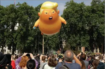  ?? PICTURE: AP/AFRICAN NEWS AGENCY (ANA) ?? A 6m high cartoon baby blimp of US president Donald Trump is flown as a protest against his visit, in Parliament Square in London, England, yesterday.