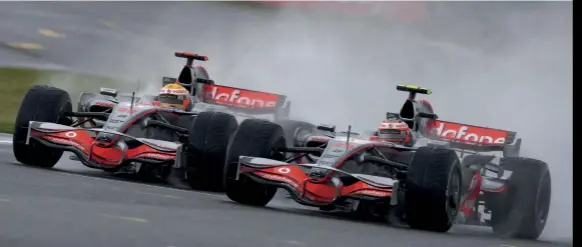  ??  ?? Mclaren pair Lewis Hamilton and Heikki Kovalainen battle through Stowe for the lead of the 2008 race. Hamilton, on the inside, wrestled the place from the Finn and went on to win – the British driver’s first F1 victory at home – by over a minute from Nick Heidfeld and Rubens Barrichell­o