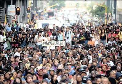  ??  ?? University students gather at Luthuli House to hand a memorandum to ANC secretary-general Gwede Mantashe during the #Feesmustfa­ll protest.where were they when the rest of us protested against the theft of state funds, asks a reader.