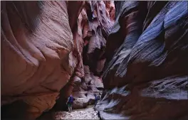  ?? LENNIE MAHLER – THE ASSOCIATED PRESS ?? Two hikers were found dead and another was rescued from Buckskin Gulch, in Kane County, Utah, after rainfall led to flash flooding.