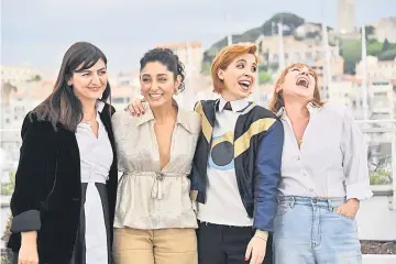  ?? — AFP photo ?? (From Left) French producer Didar Domehri, French-Iranian actress Golshifteh Farahani, French director Eva Husson and French actress Emmanuelle Bercot pose on May 13 during a photocall for the film ‘Girls of The Sun’ (‘Les Filles Du Soleil’) at the...