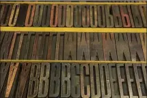  ?? NIKKI KAHN — THE WASHTINGTO­N POST ?? Printing press letters from an old poster company were purchased by the Maryland Institute College of Art after the Baltimore company went out of business in 2013.