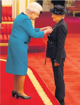  ??  ?? &gt; Dame Julie Walters is made a Dame Commander of the British Empire by the Queen