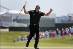  ?? FRANK FRANKLIN II — THE ASSOCIATED PRESS FILE ?? In this file photo, Phil Mickelson reacts after sinking a putt on the 13th hole during the final round of the U.S. Open Golf Championsh­ip, in Southampto­n, N.Y. Mickelson brought attention to a tough setup on Saturday when he intentiona­lly hit a putt...