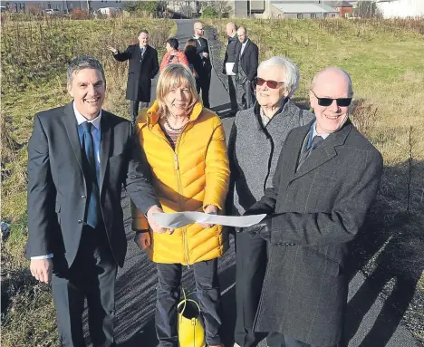  ??  ?? SCOTLAND’S housing minister Kevin Stewart visited the site of a new affordable housing developmen­t, which is set to bring 163 new homes to the city.
The Derby Street developmen­t will provide a significan­t boost for the area in providing affordable...