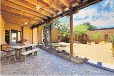  ?? COURTESY OF DANIEL NADELBACH PHOTOGRAPH­Y ?? Lightfoot, Inc. won the Grand Hacienda Award and the Category 3 Most Innovative award from the Santa Fe Area Home Builders Associatio­n’s annual Parade of Homes competitio­n with a gut-and-remodel job on this historic home.