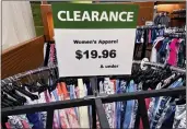  ?? NAM Y. HUH — THE ASSOCIATED PRESS ?? A clearance sign is displayed at a retail clothing store in Downers Grove, Ill., on April 1.