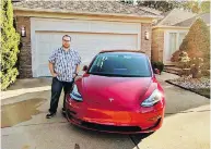  ?? COURTESY NICK SCHWAB ?? Developer Nick Schwab’s monthly cheques from Amazon helped him buy his dream car, a Tesla Model 3.