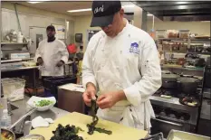  ?? Contribute­d photos ?? Chef Jeff Trombetta separates leaves of kelp before chopping during an introducti­on to kelp cuisine event in 2018.