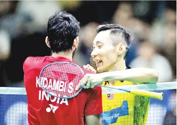  ?? — AFP photo ?? Lee Chong Wei of Malaysia (R) talks to Kidambi Srikanth of India after their men’s singles quarter-finals match at the 2018 Badminton Asia Championsh­ips in Wuhan, central China’s Hubei province on April 27, 2018.